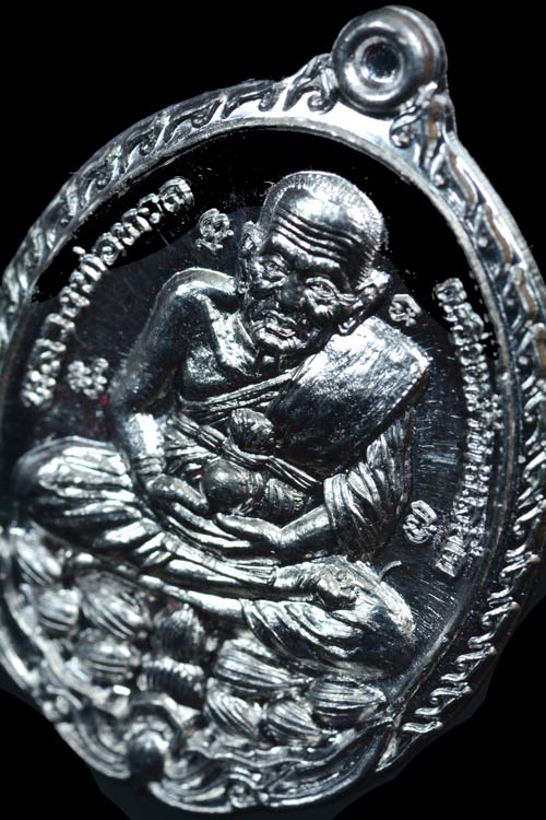 หลวงพ่อทวด หลังหลวงพ่อผล วัดทุ่งนารี จ.พัทลุง เนื้อตะกั่ว พ.ศ.2554