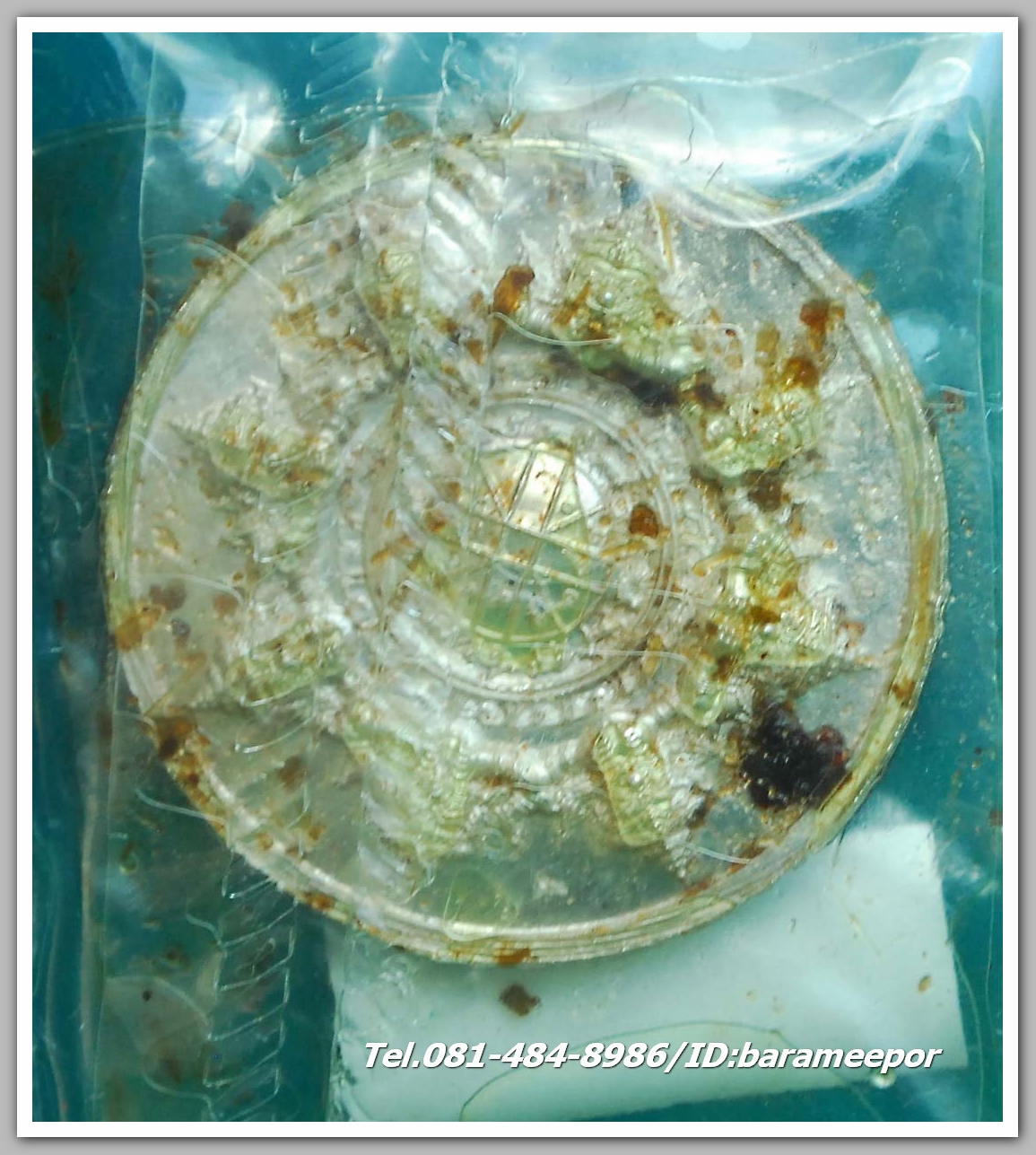 เหรียญพระปิดตาพังพะกาฬ "เจ้าสัวพันล้าน" (บอย ท่าพระจันทร์) เนื้อเงิน แช่น้ำมันเสือ