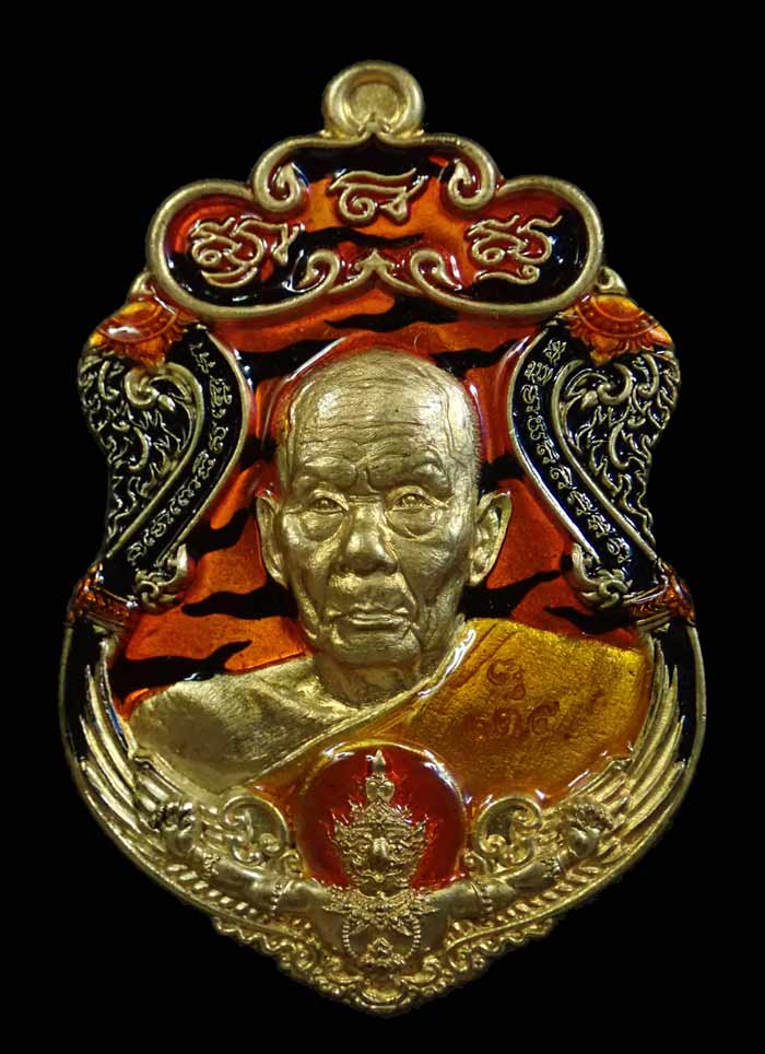 เหรียญรูปเหมือนพ่อท่านเขียว วัดห้วยเงาะ ปัตตานี ปี 2564 รุ่นเพชรทักษิณ เนื้อสัตตะลงยาลายเสือส้ม (รายการ 32 ลุ้นเนื้อ) หมายเลข 135