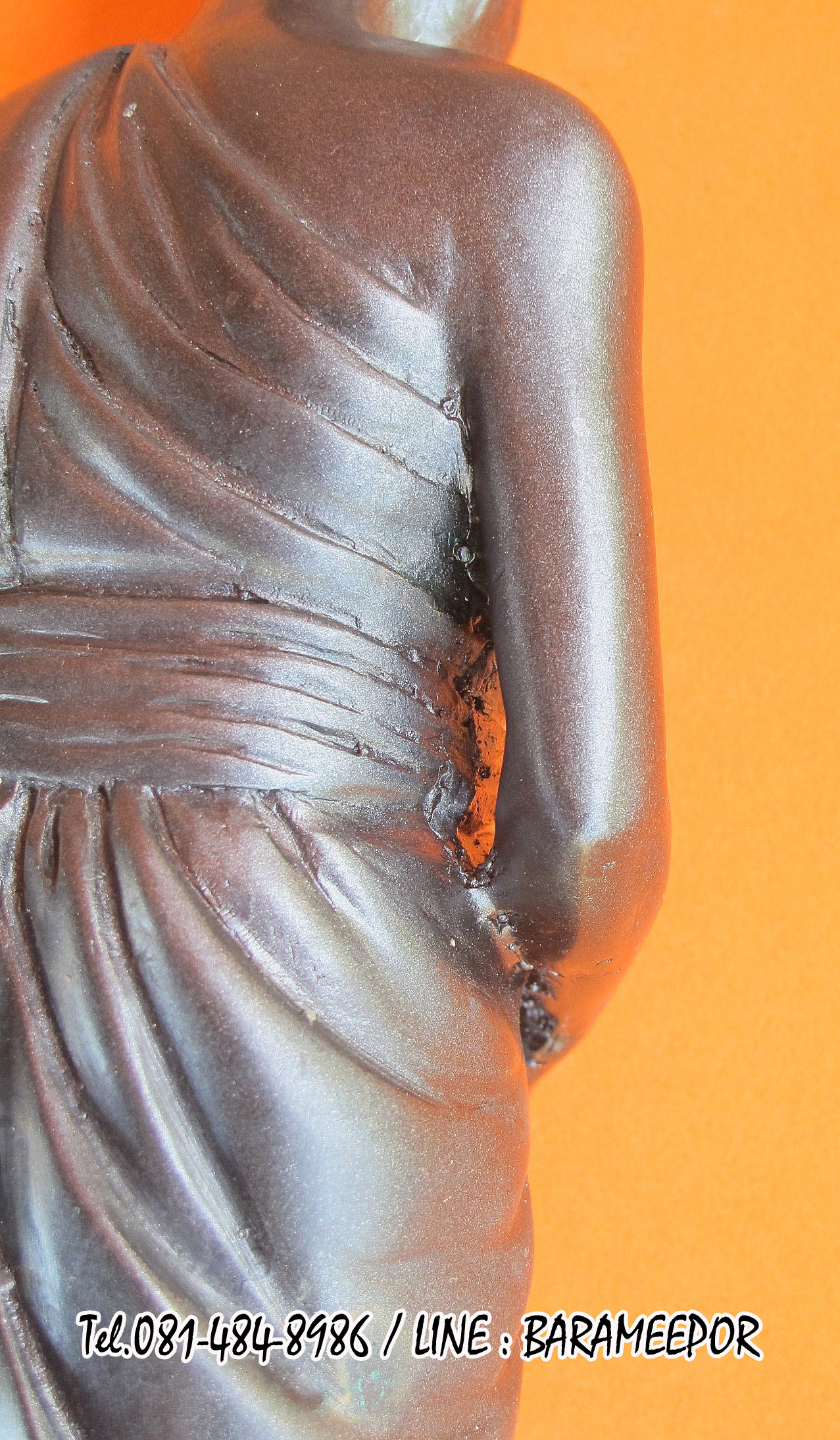 พระบูชายืน,หลวงพ่อหวน,วัดนิคมประทีป(วัดโคกหล่อ),ตรัง,รุ่นฉลองพัตรยศ ๗ รอบ ปี ๒๕๕๔ เนื้อทองแดงรมดำ