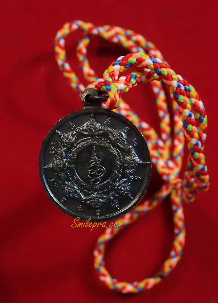 เหรียญปิดตาพังพะกาฬพร้อมเชือก 7 สี องค์พ่อจตุคามรามเทพ วิหารจังหวัดนราธิวาส เหรียญเนื้อทองแดงรมดำ
