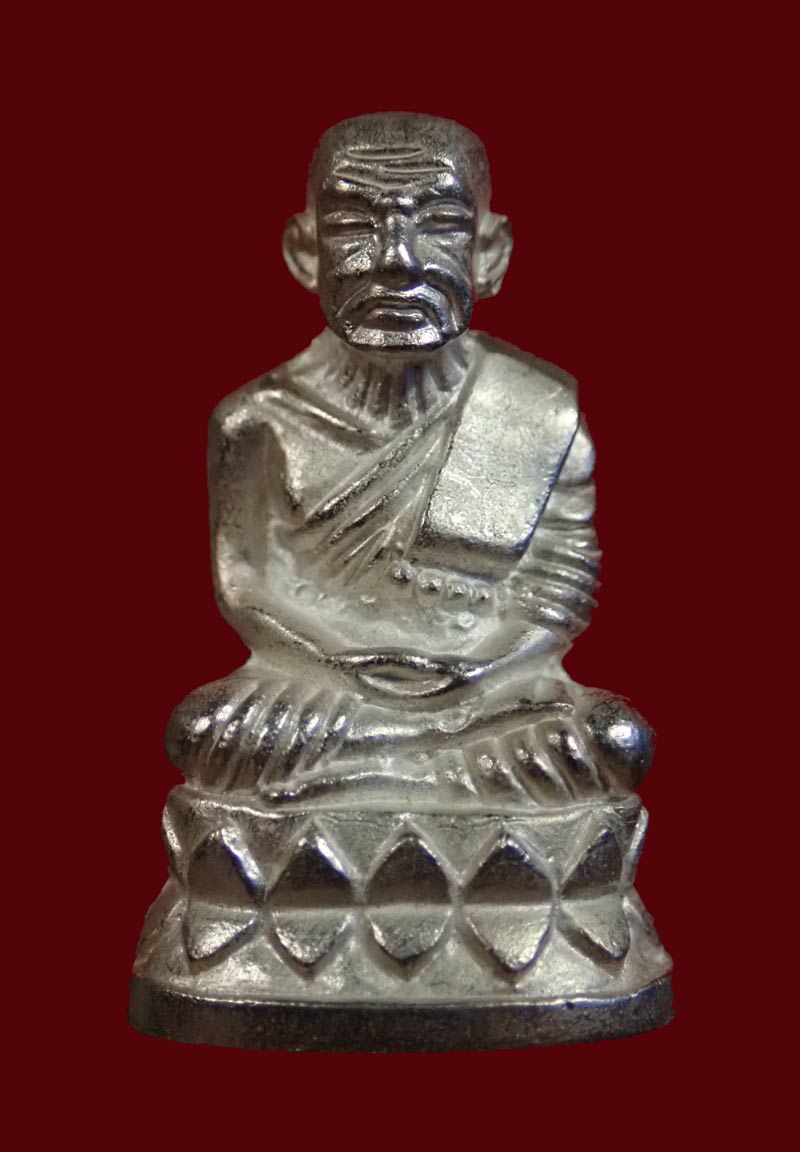 รูปหล่อบัวรอบหลวงพ่อทวด อาจารย์ทอง วัดสำเภาเชย ปี 2549 รุ่นพระธาตุเจดีย์ เนื้อเงิน หมายเลข 933