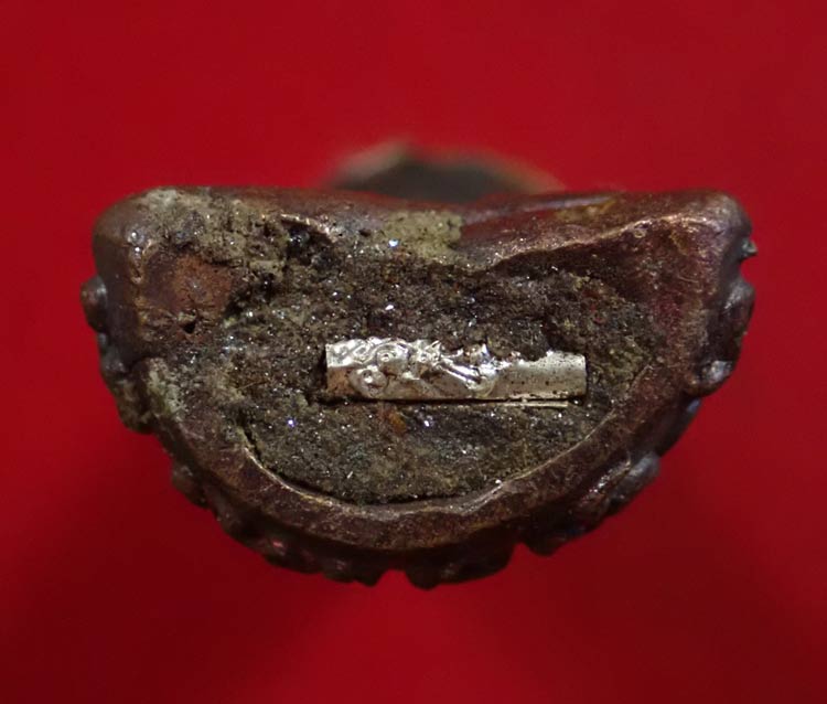 พระปิดตายันต์ยุ่ง มหายันต์มหามงคลหลวงพ่อคูณ วัดบ้านไร่ ปี 2556 รุ่นสร้างบารมี เนื้อทองแดงมันปูตะกรุดเงิน หมายเลข 1989