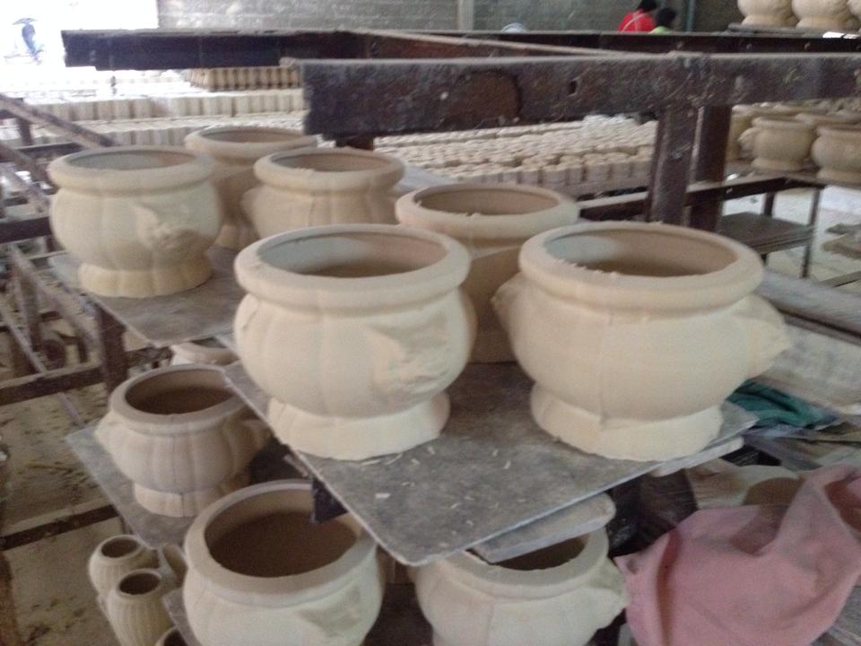 กระถางธูปหัวสิงห์มุก