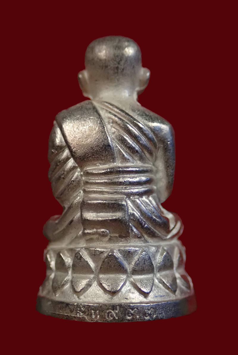 รูปหล่อบัวรอบหลวงพ่อทวด อาจารย์ทอง วัดสำเภาเชย ปี 2549 รุ่นพระธาตุเจดีย์ เนื้อเงิน หมายเลข 933