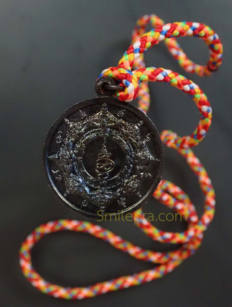 เหรียญปิดตาพังพะกาฬพร้อมเชือก 7 สี องค์พ่อจตุคามรามเทพ วิหารจังหวัดนราธิวาส เหรียญเนื้อทองแดงรมดำ