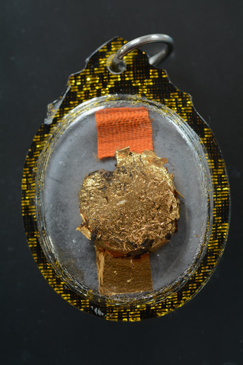 เหรียญหล่อเนื้อตะกั่วจารมือ พ่อท่านเอื้อม วัดบางเนียน จ.นครศรีธรรมราช (พิมพ์ครึ่งองค์)