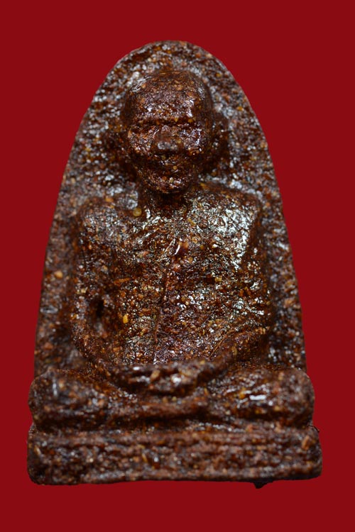 หลวงปู่คำพันธ์ วัดธาตุมหาชัย พิมพ์พระรูปเหมือนลอยองค์ เนื้อผงเกสร หลังเตารีด ปี 2538
