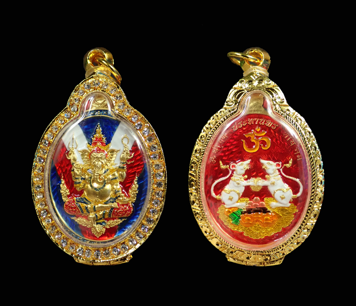 เหรียญพระพิฆเนศ รุ่นประทานพร หลวงปู่อิ่ม ปัญญาวุโธ วัดทุ่งนาใหม่ นครศรีธรรมราช เนื้อชุบทองคำแท้ พิเศษ คุ้ยพื้นลงยาธงชาติ ลงยาเครื่องทรงหลังลงยาเต็มสูตร พระอยู่ในชุดลุ้นเลข 111 - 999 องค์นี้หมายเลข 666