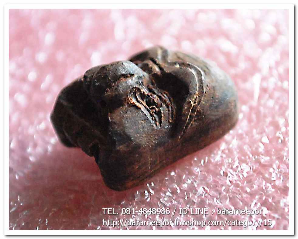 หน้านายพราน หลวงพ่อเขียว วัดห้วยเงาะ ปัตตานี เนื้อไม้