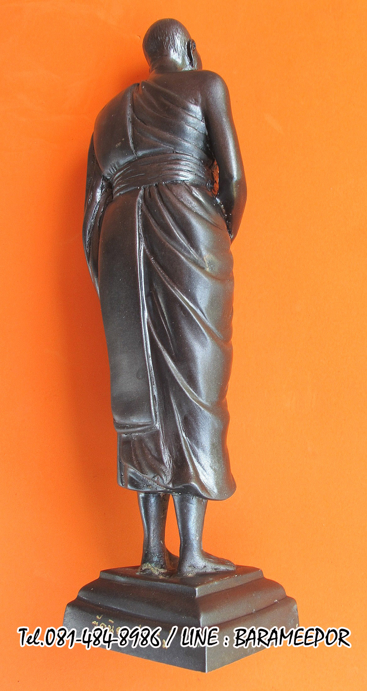 พระบูชายืน,หลวงพ่อหวน,วัดนิคมประทีป(วัดโคกหล่อ),ตรัง,รุ่นฉลองพัตรยศ ๗ รอบ ปี ๒๕๕๔ เนื้อทองแดงรมดำ