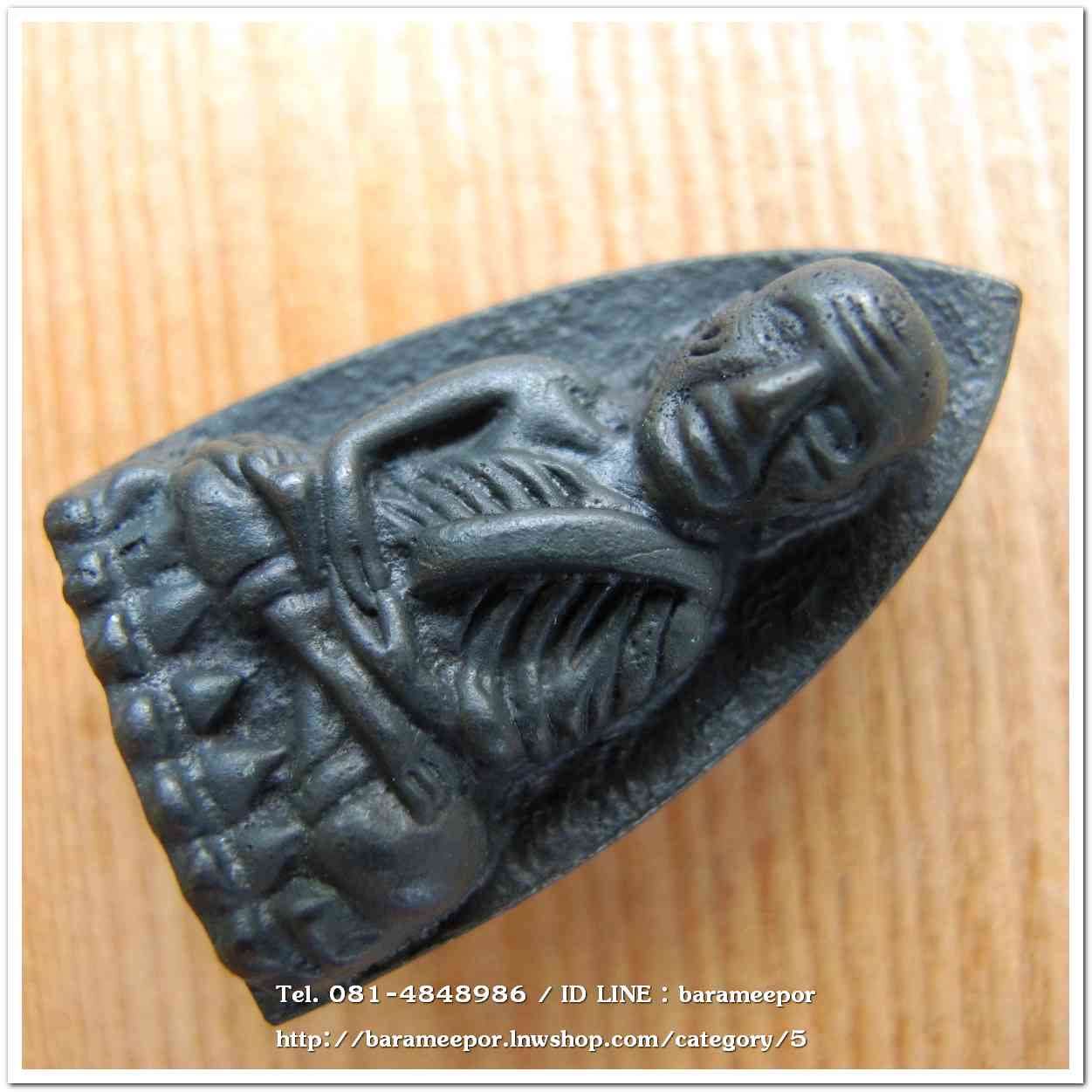 หลวงพ่อทวด 101 ปี อ.ทิม พิมพ์เตารีดใหญ่ A หลัง รูปอ.ทิม เนื้อนวะแก่เงิน หมายเลข ๑๑๕๕