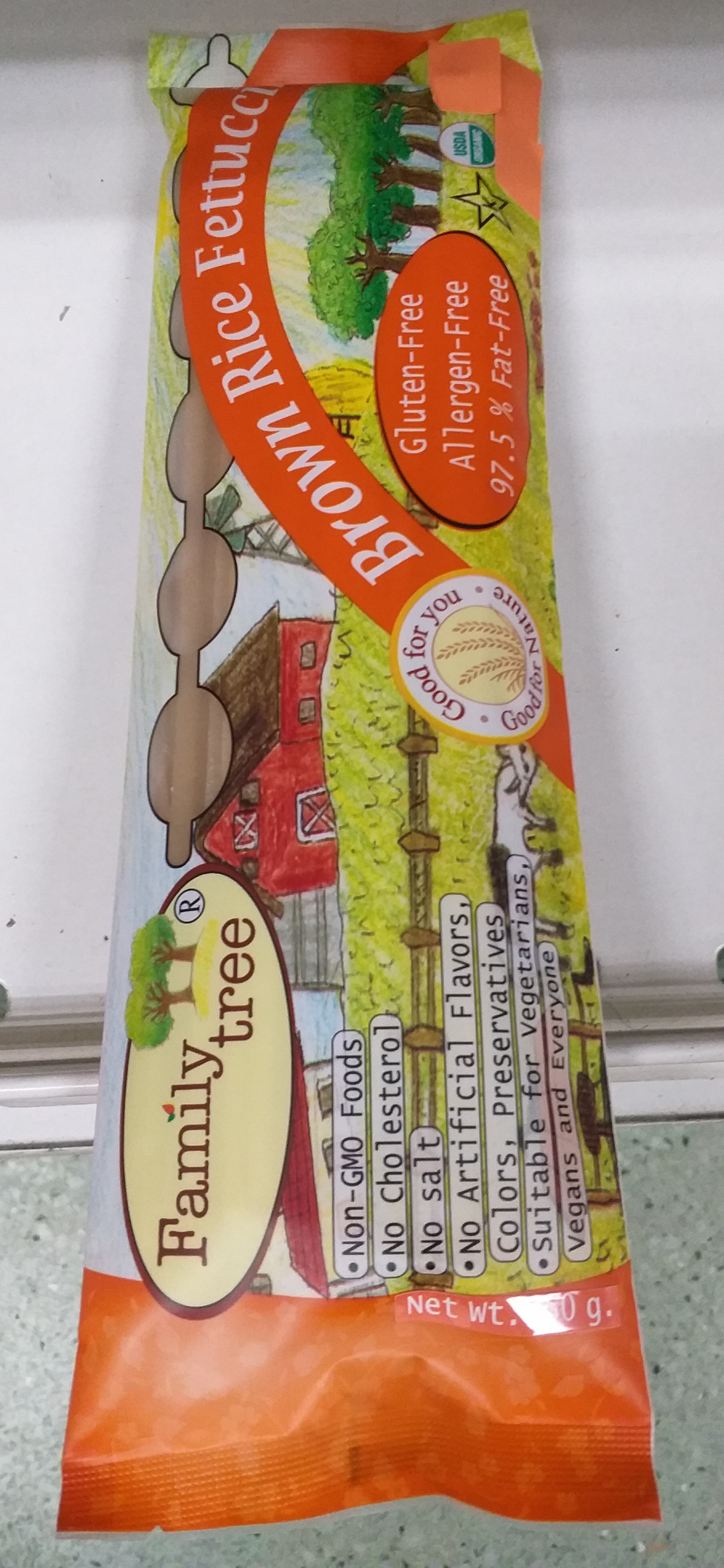 22-412-2100-1 เส้นผัดไทข้าวกล้องอินทรีย์เฟตูชินี่ เส้นเล็ก250 กรัม แฟมมิลี่ (ซองสีส้ม)