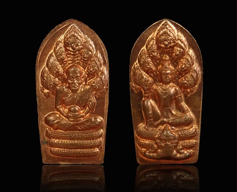 ปรกมะขามราชันดำ (รุ่นแรก) องค์พ่อจตุคามหลังหลวงปู่ทวด วัดพุทไธศวรรย์ ปี 2546 เนื้อทองแดงผิวไฟ