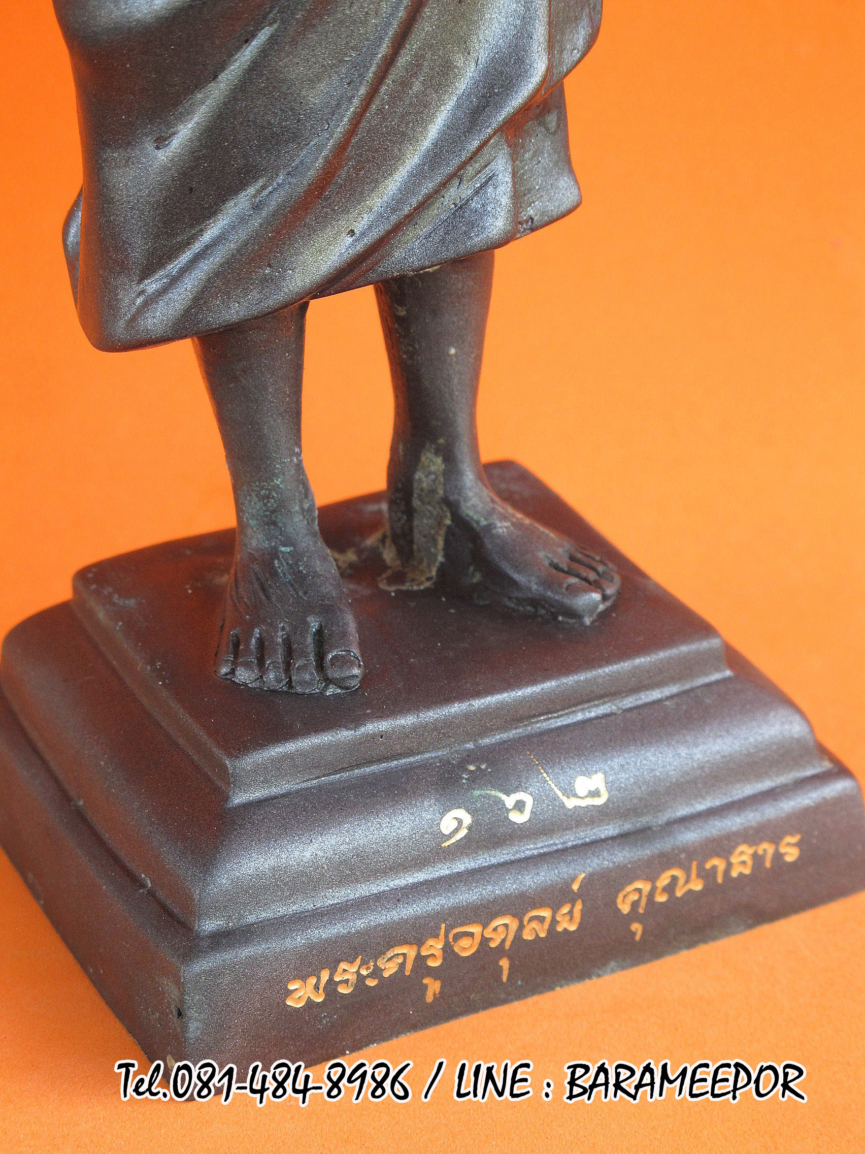 พระบูชายืน,หลวงพ่อหวน,วัดนิคมประทีป(วัดโคกหล่อ),ตรัง,รุ่นฉลองพัตรยศ ๗ รอบ ปี ๒๕๕๔ เนื้อทองแดงรมดำ