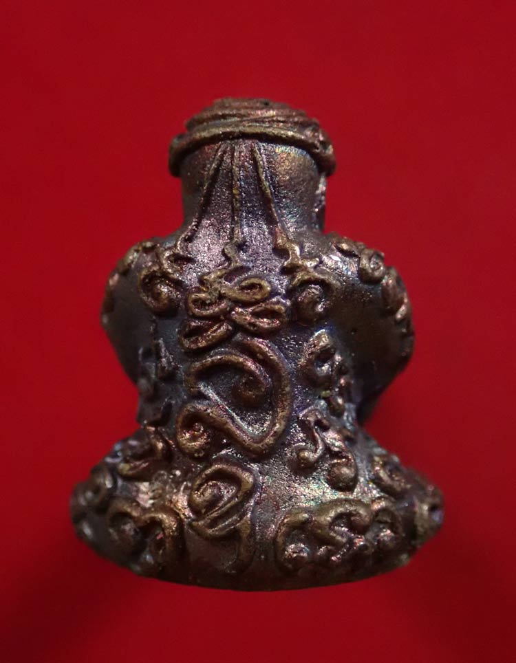 พระปิดตายันต์ยุ่ง มหายันต์มหามงคลหลวงพ่อคูณ วัดบ้านไร่ ปี 2556 รุ่นสร้างบารมี เนื้อทองแดงมันปูตะกรุดเงิน หมายเลข 1989