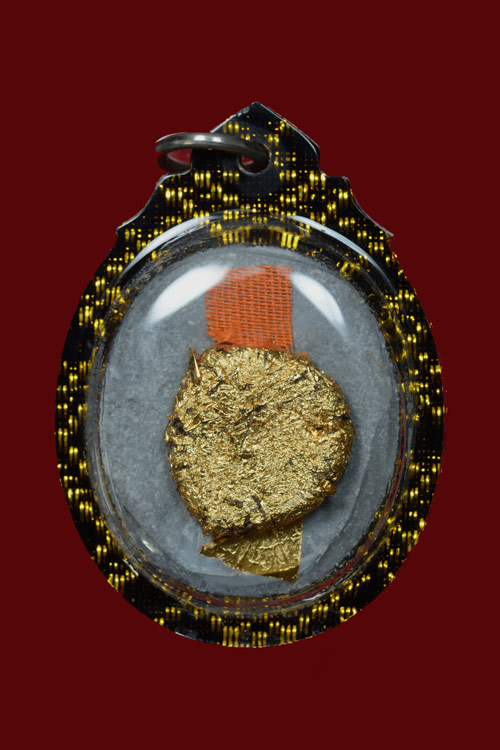 เหรียญหล่อเนื้อตะกั่วจารมือ พ่อท่านเอื้อม วัดบางเนียน จ.นครศรีธรรมราช (พิมพ์นั่งเต็มองค์)