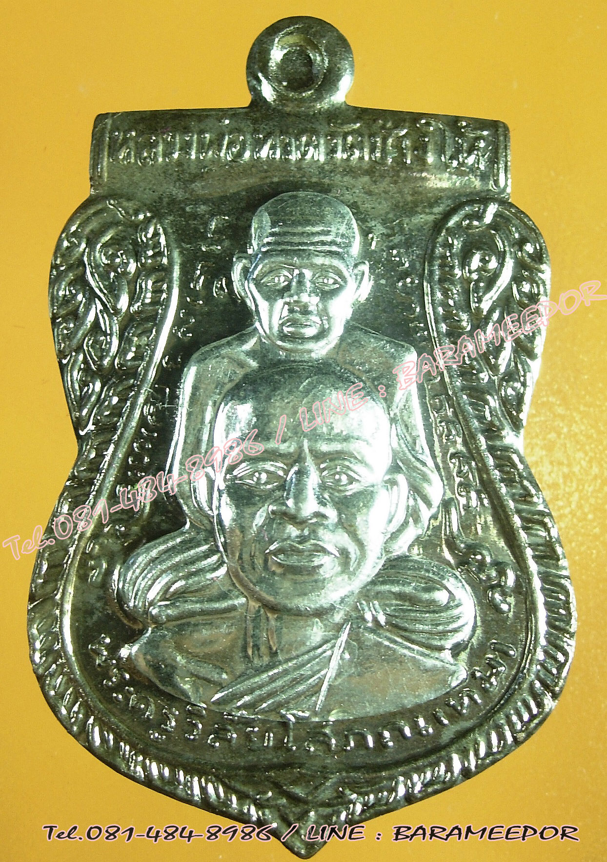 หลวงพ่อทวด วัดช้างไห้ รุ่นสร้างพิพิธภัณฑ์ 58 พิมพ์เสมาพุตซ้อน เนื้อนวะโลหะ หน้ากากเงิน หมายเลข ๑๙๒๓