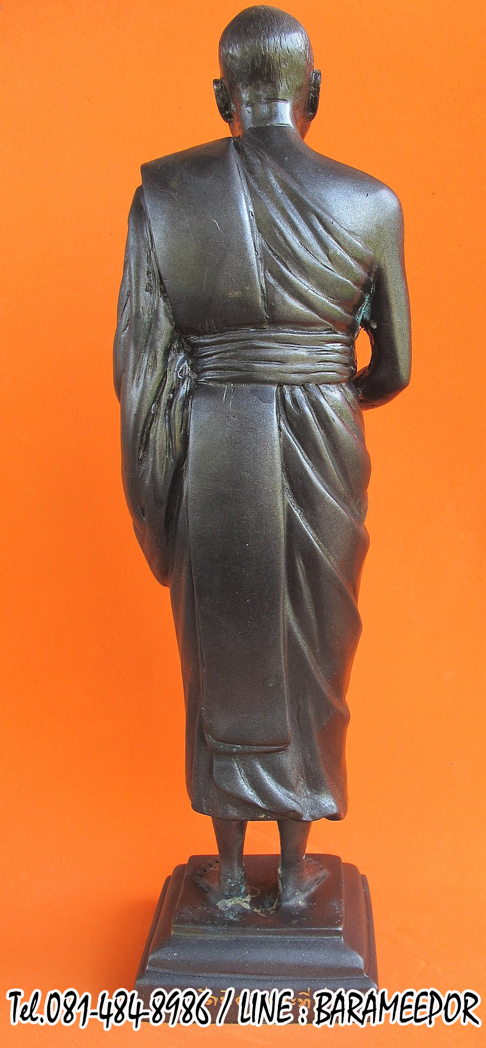 พระบูชายืน,หลวงพ่อหวน,วัดนิคมประทีป(วัดโคกหล่อ),ตรัง,รุ่นฉลองพัตรยศ ๗ รอบ ปี ๒๕๕๔ เนื้อทองแดงรมดำ