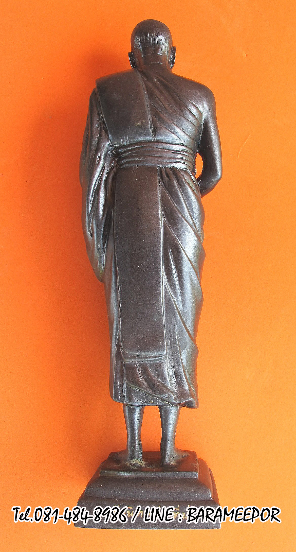 พระบูชายืน,หลวงพ่อหวน,วัดนิคมประทีป(วัดโคกหล่อ),ตรัง,รุ่นฉลองพัตรยศ ๗ รอบ ปี ๒๕๕๔ เนื้อทองแดงรมดำ