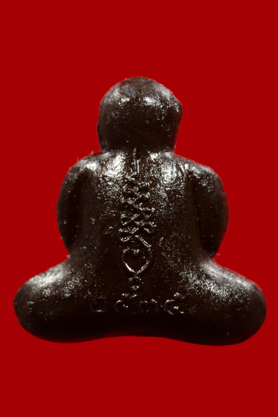 พระปิดตาหลวงปู่คำพันธ์ วัดธาตุมหาชัย เนื้อดินเก้าบัง พ.ศ.2536