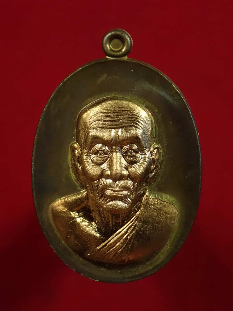 เหรียญหน้าอรหันต์ (หน้าแก่) หลวงพ่อทวด รุ่นนิรันตราย77 ที่ระลึกงานบุญสุขในหัวใจ ปี2556 เนื้อมหาชนวนองค์ทองสัตตะ (พิมพ์ใหญ่) หมายเลข 1002