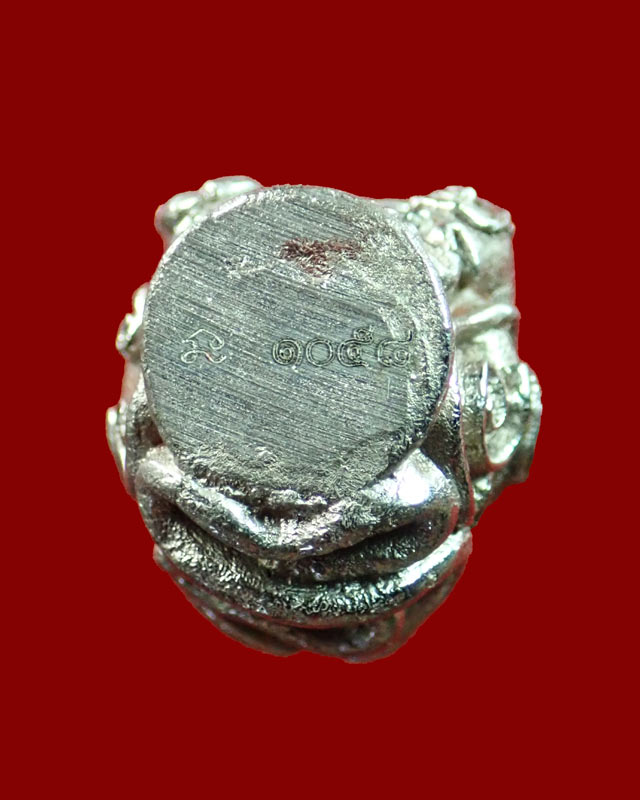 พระปิดตาในครรภ์ พ่อท่านเขียว วัดห้วยเงาะ ปัตตานี รุ่นกลันตัน54 ปี 2554 เนื้อปัญจะโลหะผิวพรายเงิน หมายเลข 1058