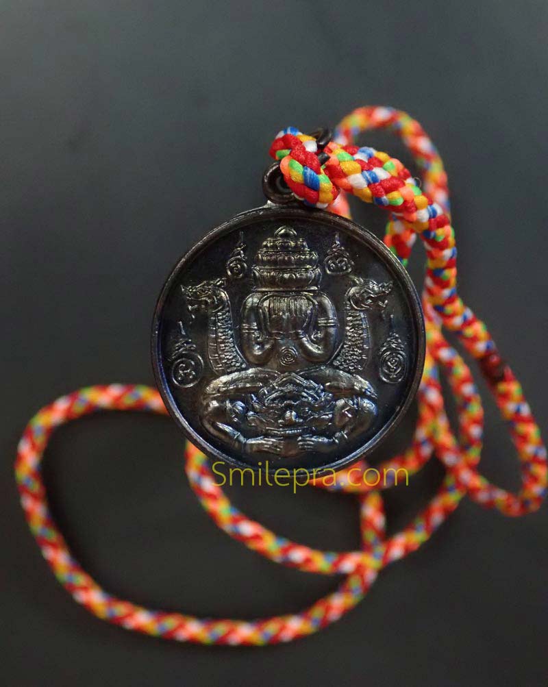 เหรียญปิดตาพังพะกาฬพร้อมเชือก 7 สี องค์พ่อจตุคามรามเทพ วิหารจังหวัดนราธิวาส เหรียญเนื้อทองแดงรมดำ
