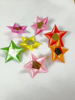 เหรียญโปรยทาน (แบบที่ 1 ดาวกระจาย)