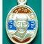 หลวงพ่อทวด 100 ปี อ.ทิม ศาลหลักเมือง เหรียญเม็ดแตง เนื้อเงินลงยาราชาวดีสีธงชาติ