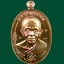 เหรียญหลวงพ่อคูณ วัดบ้านไร่ รุ่นมนต์พระกาฬปราบไพรี ปี 2557 เนื้อทองแดงผิวรุ้งหลังแบบ (กรรมการ)
